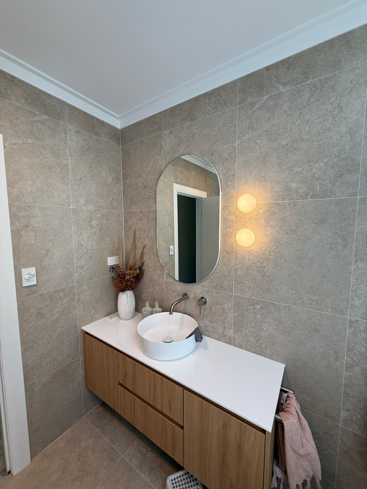 Bathroom with warm wall lights